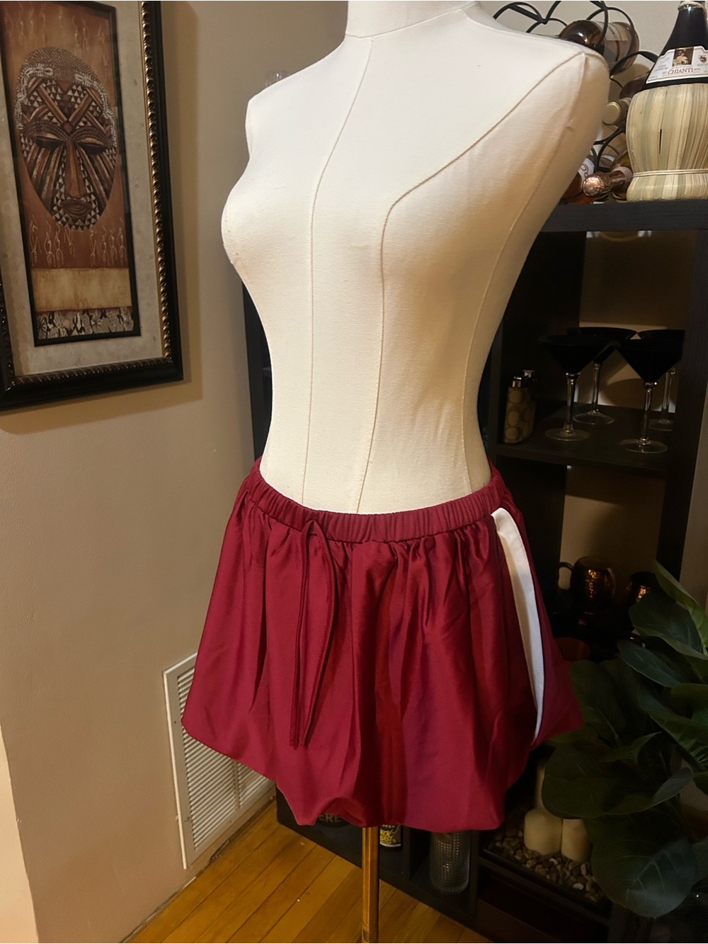 AKIRA Wine Athletic Skirt with White Tag Accent